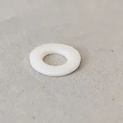 Achsdistanzen TEFLON (1) Distanzen Ø Innen 3,2 mm x 0,5 mm dick, f. 3 mm Slotcar Achsen und Wackler / T-Hülsen