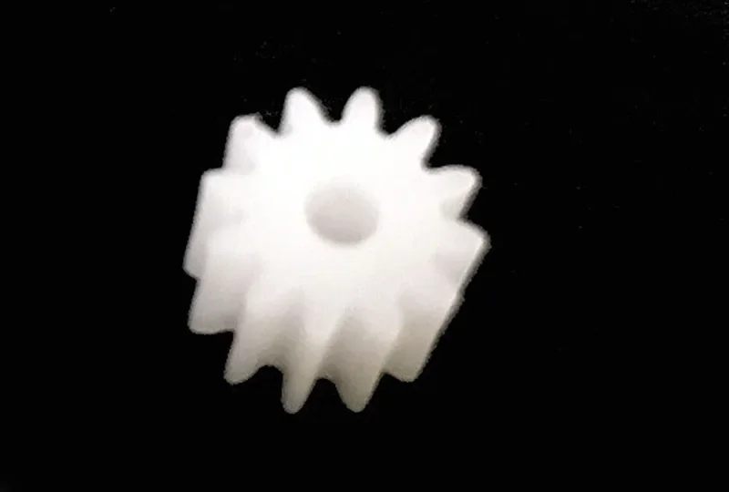 Motorritzel (1), 11 Zähne, 11Z, M50, Kunststoff , zum Aufpressen für Motorwellen Ø2mm