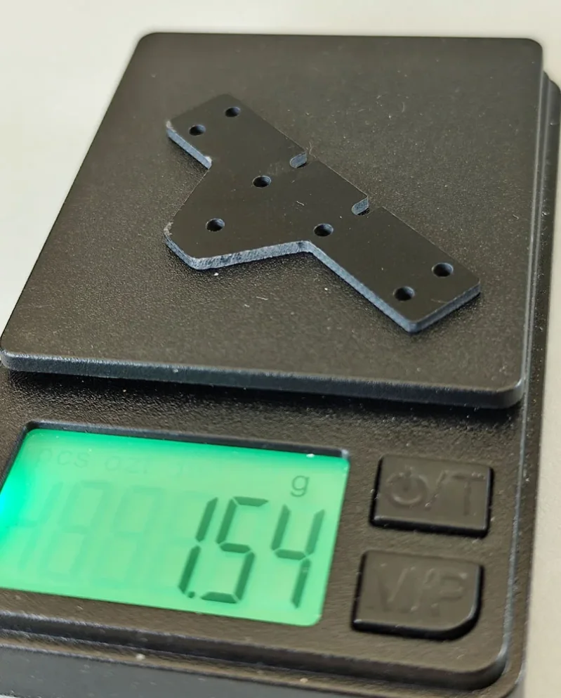 SCT-SF, GFK/CFK/ME, V2 Achs-Abstandshalter 8 Loch (länger), hinten, varibale Stärken und Materialien 0.01-2.0mm