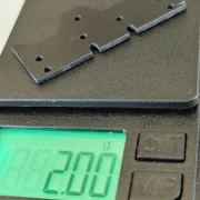 SCT-SF, GFK/CFK/ME, V3 Achs-Abstandshalter 8 Loch (länger, breiter), hinten, varibale Stärken und Materialien 0.01-2.0mm