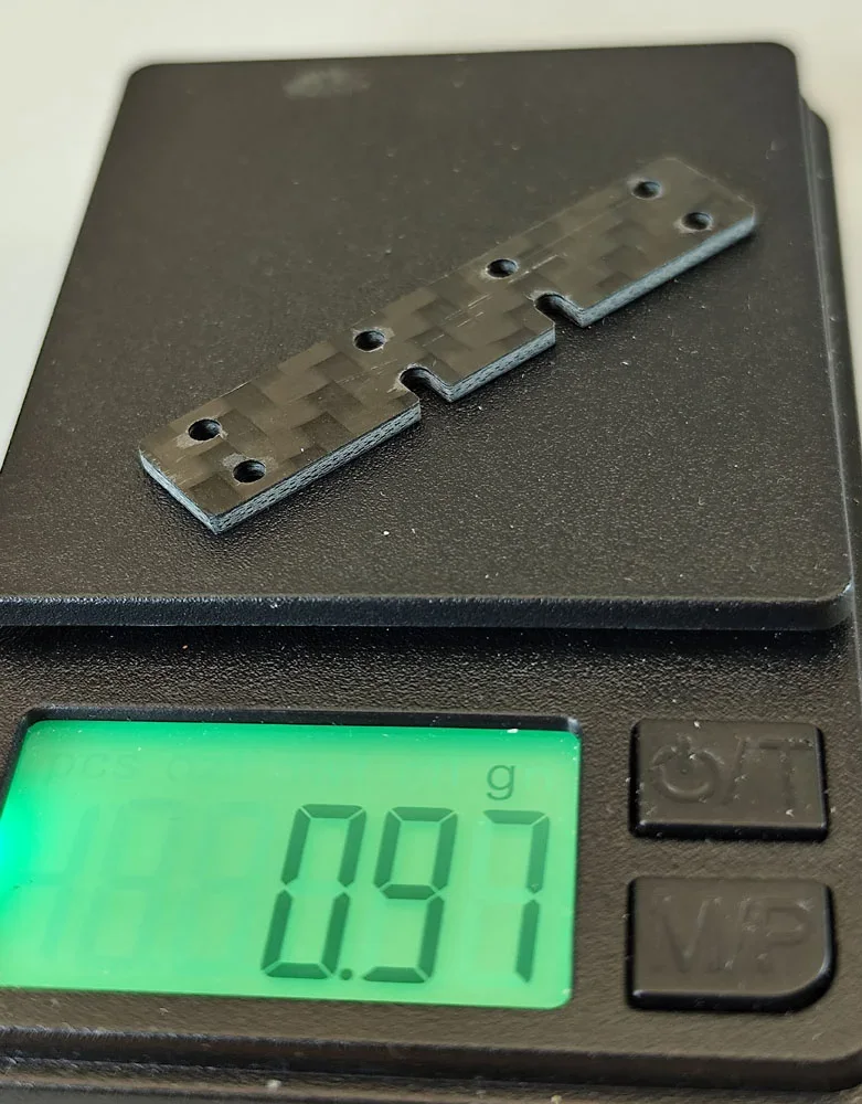 SCT-SF, GFK/CFK/ME, V1 Achs-Abstandshalter 8 Loch (schmal), hinten, varibale Stärken und Materialien 0.01-2.0mm